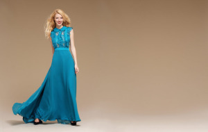 Style #0804, floor-length A-line chiffon gown with a button up collar top with lace ruffles, available in turquoise, orange and black
