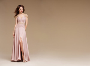 Style #0825, a-line floor length chiffon dress with pleated bodice, gold embroidery decorated on the shoulders and along underneath the chest, available in pink and cream