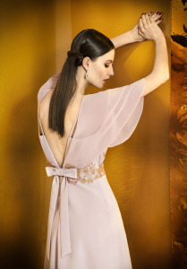 Style #931, knee-length cocktail dress with chiffon bat sleeves, open V-back and gold embroidery on the top, available in powder, dark cream, black