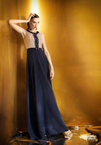 Style #921b, maxi A-line evening gown with an embroidered keyhole neckline, available in beige-blue