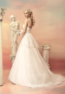 Style #1502L, strapless lace a-line wedding gown with peplum, available in white and ivory