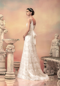 Style #1505, sequin fit and flare wedding dress with draped bodice, available in white and ivory