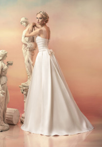 Style #1515, illusion neckline wedding dress with pleated a-line skirt, available in white and ivory