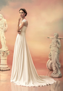 Style #1518L, a-line chiffon wedding dress with floral applique shoulder detail, available in white and ivory