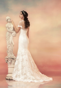 Style #1530L, plunging neckline fit and flare lace wedding dress with sleeves, available in white and ivory