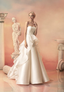 Style #1531, a-line mikado wedding dress with organza peplum, available in white and ivory