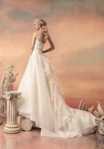 Style #1540L, a-line wedding gown with ruffled organza train, available in white and ivory