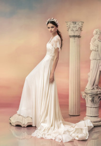 Style #1549L, a-line chiffon wedding dress with long train and separate lace cap sleeve bolero, available in white and ivory