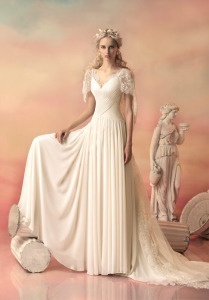 Style #1550L, chiffon a-line wedding dress with draped bodice and lace capelet detail, available in white and ivory