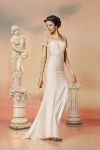 Style #1564L, sheath wedding dress with lace trimmed sleeves and plunging neckline, available in white and ivory