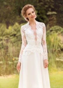 Style #1441, long sleeve lace wedding gown with plunging neckline, available in white and ivory