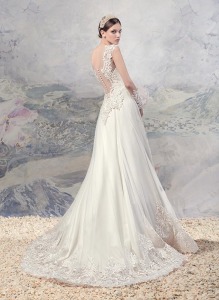 Style #1604, A-line wedding dress with plunging neckline and lace details, available in ivory