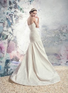 Style #1608L Premium, strapless fit and flare jacquard wedding gown, available in light ivory