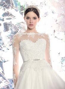 Style #1628L, tulle ball gown wedding dress with beaded lace illusion neckline and sleeves, available in ivory