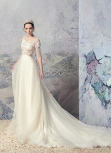 Style #1635L, A-line wedding gown with lace illusion neckline and 3/4 length sleeves, available in ivory