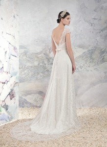 Style #1652L Premium, lace sheath wedding gown with cap sleeves and plunging back, available in cream