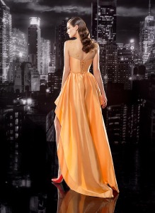 Style #114, high-low dress with mesh overlay on top decorated with 3D flowers, available in orange, olive, milk and red