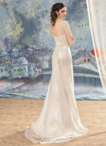 Style #1715, beaded lace sheath wedding dress with illusion 3/4 length sleeves and embroidery around the waist, available in ivory