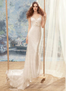 Style #1730L, sheath wedding dress with lace and flower décor and illusion back, available in cream