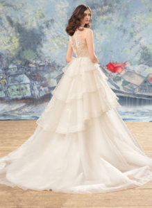 Style #1739, ball gown with tulle tiered skirt and lace bodice, available in ivory (with nude bodice), ivory