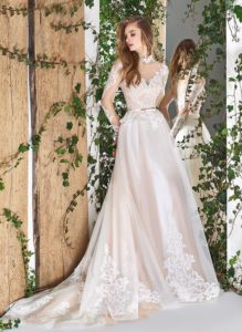 Style #1827L, high neck a-line wedding dress, designed with illusion sweetheart neckline, long sleeves, and lace embroidery, available in ivory and ivory-pink