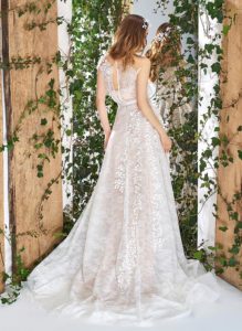 Style #1839L, lace a-line wedding dress, designed with illusion neckline and back, short sleeves, and floral decor, available in ivory and ivory-gold