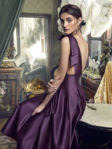 Style #451, Evening gown with plunging neckline and voluminous skirt, available in black, crimson, eggplant, grey, purple, white, ivory