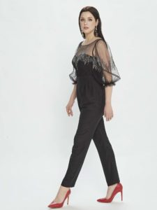 Style #M509-8, jumpsuit with bishop sleeves and pleated pants, available in burgundy, powder, black, ivory