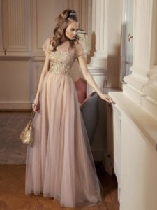 Style #501, A-line evening gown with cap sleeves and embellished bodice, available in ivory-nude, powder
