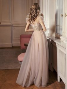 Style #501, A-line evening gown with cap sleeves and embellished bodice, available in ivory-nude, powder