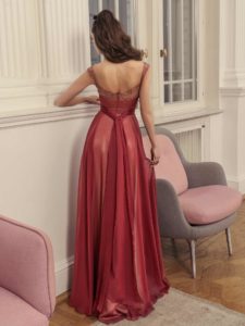 Style #520b, A-line evening gown with unique straps and straight neckline, available in ivory, grey-pink, burgundy, grey, coral