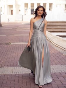 Style #572, luxury formal dress with asymmetrical designs and slit on the leg, available in grey, terracotta