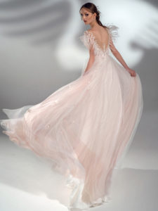 Style #2100, A-line wedding dress with feather decor and cup sleeves, available in pink, ivory