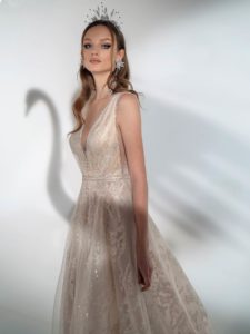 Style #2134, sparkly A-line wedding dress with V-neckline, available in cream-nude, cream