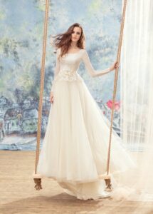 Long sleeve ball gown wedding dress with peplum style bodice
