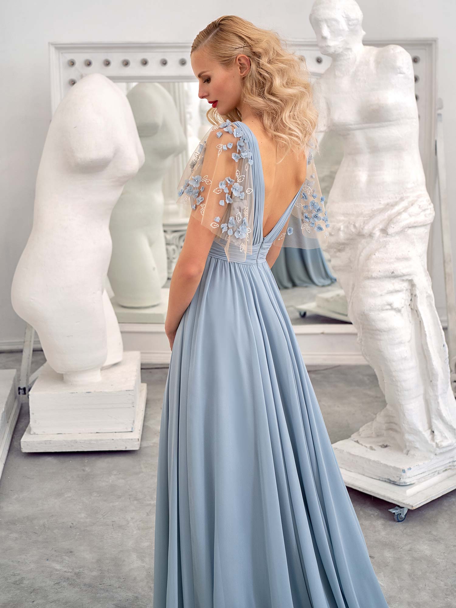 Style #636, sheath evening gown with V-neck and flutter sleeves; available in ivory, cherry, blue, azure, yellow, black, green