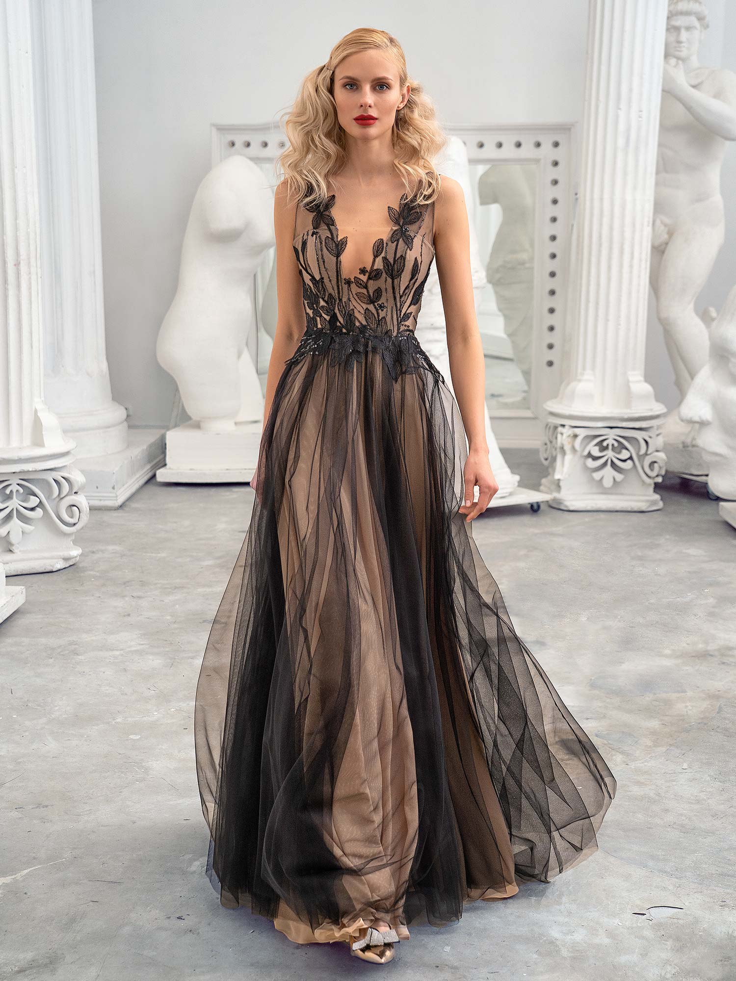 Style #656b, sleeveless A-line formal dress with floral lace top and flowy tulle skirt; available in midi or maxi length; in black-nude, black-powder, ivory, ivory-blue, ivory-powder