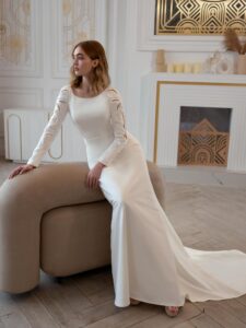 Plain wedding dress with long sleeves and open back