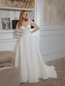 Organza A-line wedding dress with lace bustier style corset and long sleeves