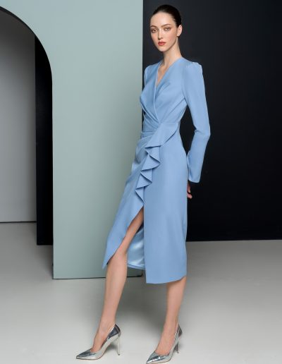 Long sleeve cocktail dress with a flounce detail