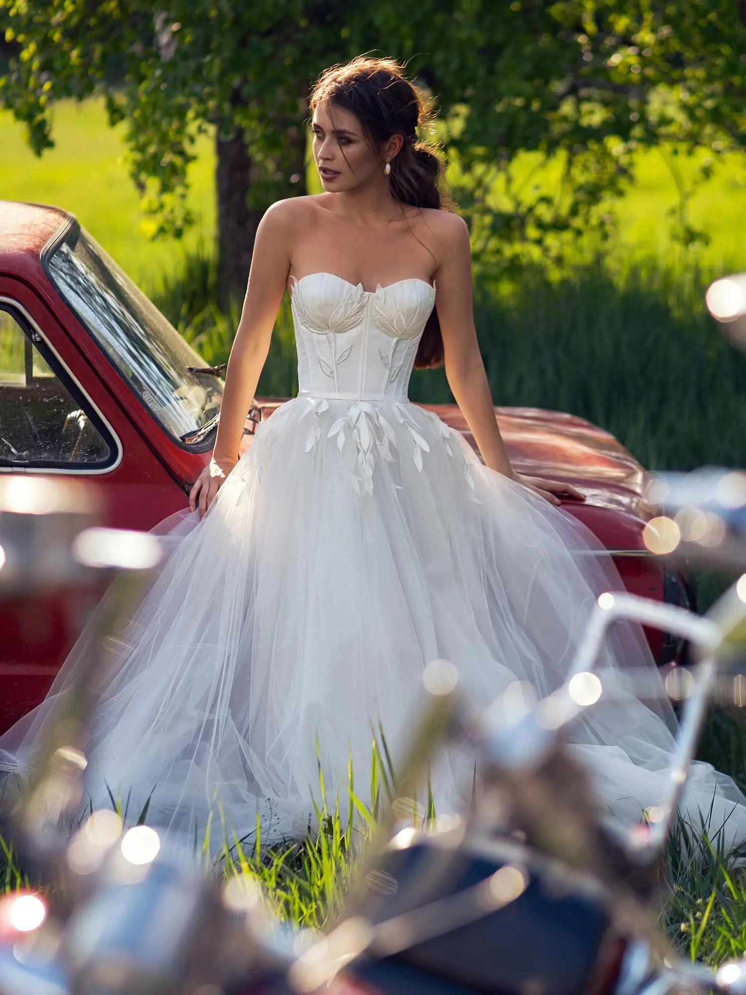 Best Wedding Dress for Body Type - Athletic: Strapless corset ball gown wedding dress with structured bodice and layered tulle skirt, designed to add curves and femininity. Available at Papilio Boutique in Toronto.