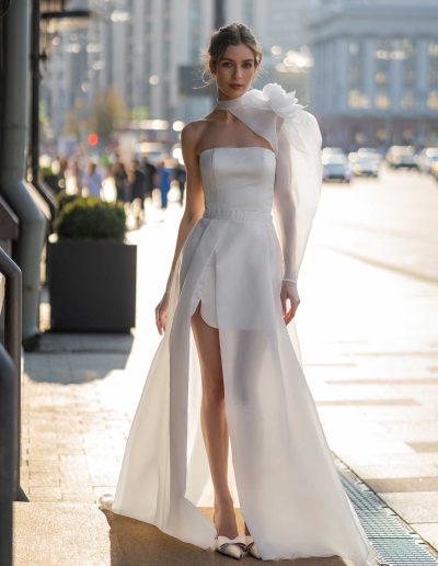 Elegant bride in a mini wedding dress with a detachable skirt and floral detail from Papilio Boutique, Toronto bridal store.