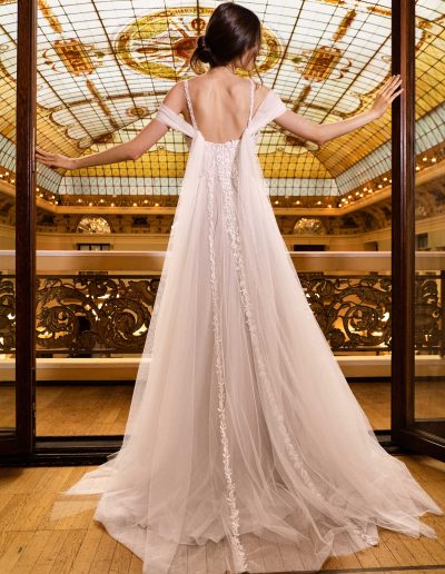 Romantic A-line bridal gown with flowing capes and embroidered bodice, by Papilio Boutique Toronto bridal store.