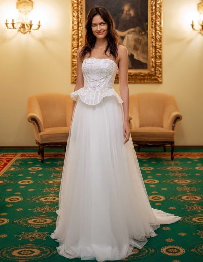 Front view of a bride in a Papilio Boutique Toronto bridal corset and skirt, perfect for a timeless wedding look.