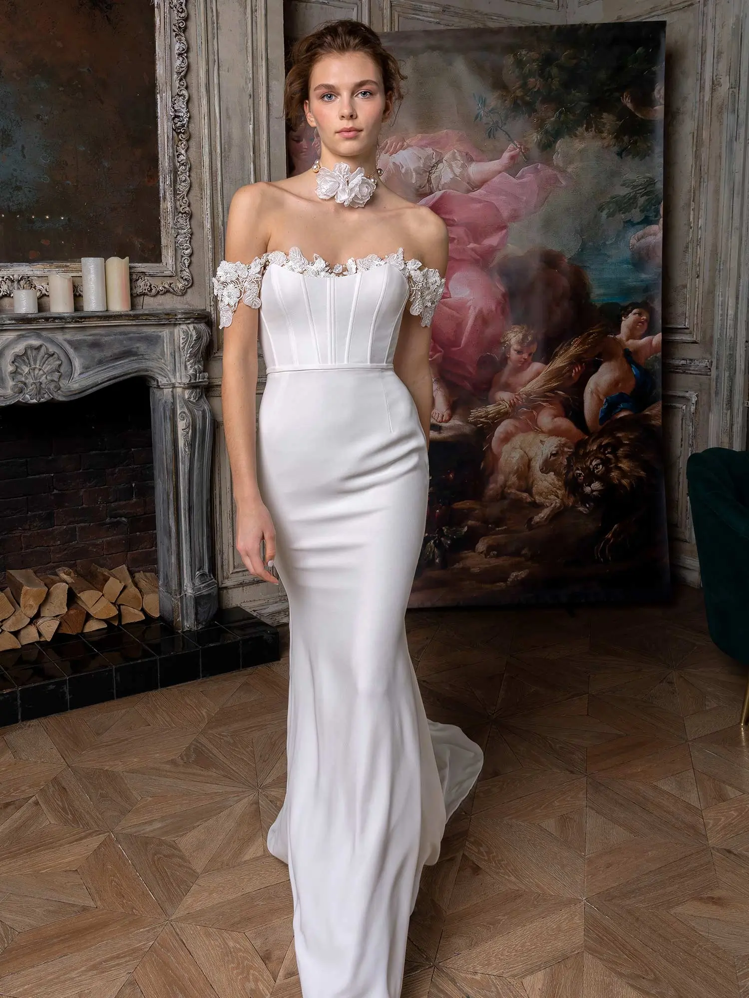 Best Wedding Dress for Body Type - Tall: Sleek off-the-shoulder mermaid wedding dress with corset boning and lace appliqué, designed to complement tall and slender brides. Available at Papilio Boutique in Toronto.