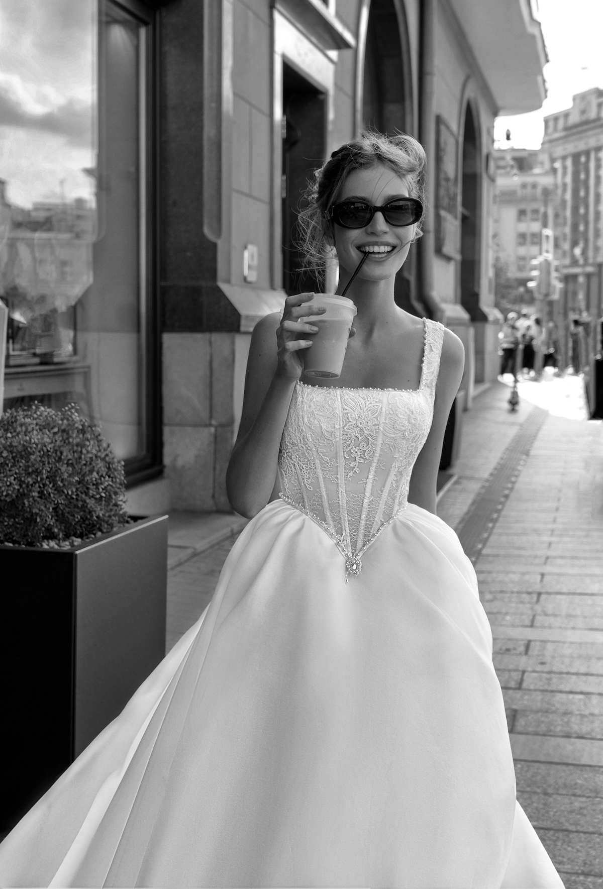 A charming drop waist wedding dress with intricate beading and a full organza skirt, showcasing the fairy-tale quality of drop waist wedding dresses from Papilio Boutique in Toronto.